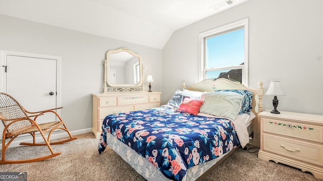 bedroom featuring visible vents, light colored carpet, baseboards, and vaulted ceiling