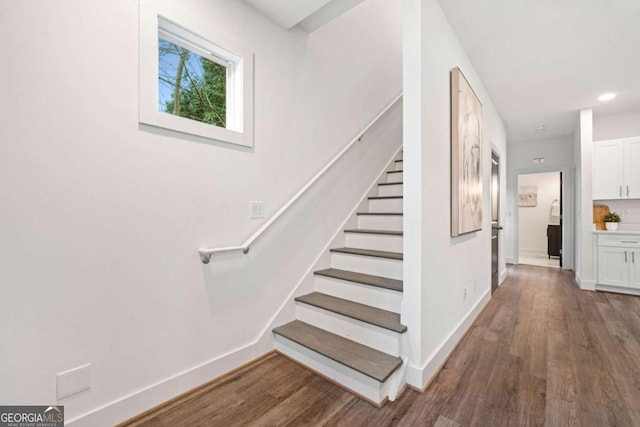 2664 Brown St NW, Atlanta, GA 30318 - stairs featuring recessed lighting, baseboards, and wood finished floors
