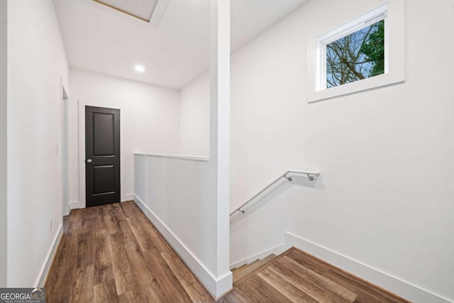 2664 Brown St NW, Atlanta, GA 30318 - corridor with recessed lighting, baseboards, an upstairs landing, and wood finished floors