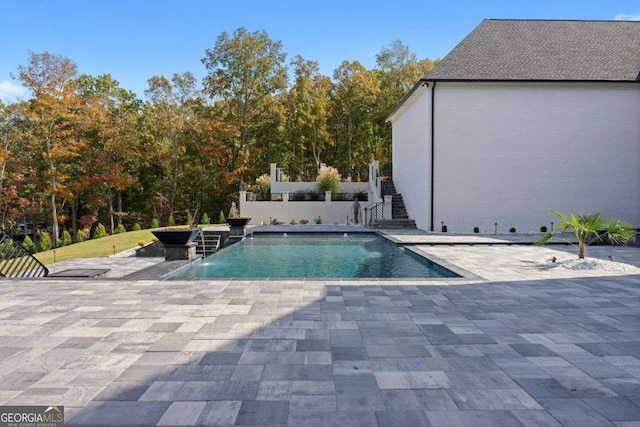 pool with a patio