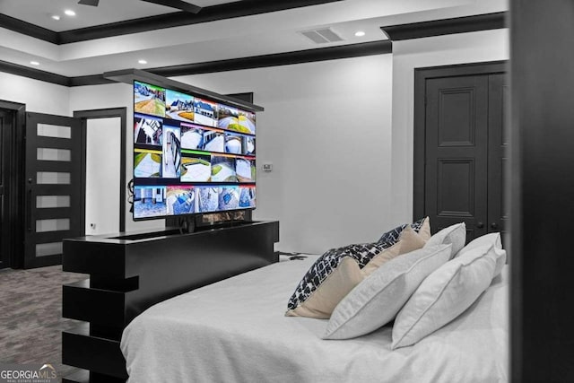 bedroom featuring recessed lighting, visible vents, and beamed ceiling