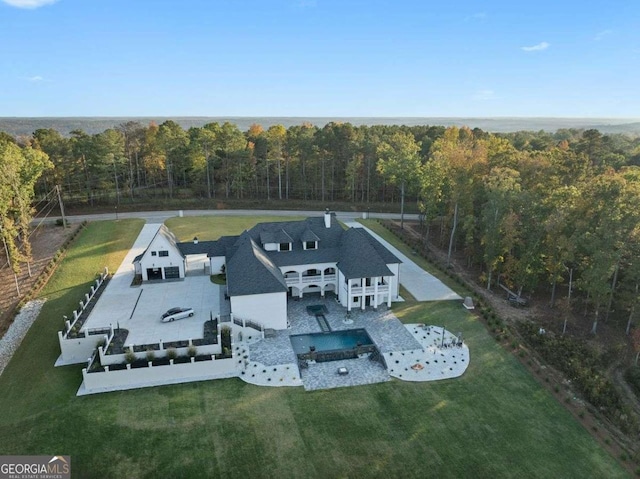 bird's eye view featuring a view of trees