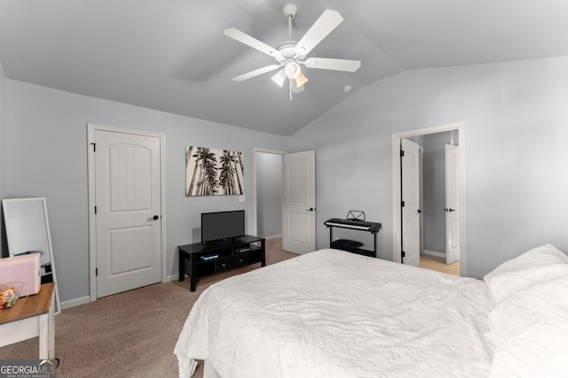 bedroom featuring baseboards, a ceiling fan, carpet, and vaulted ceiling