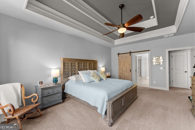 bedroom featuring a tray ceiling, baseboards, light colored carpet, and crown molding