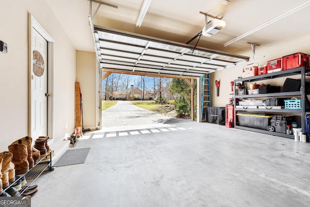 garage featuring a garage door opener