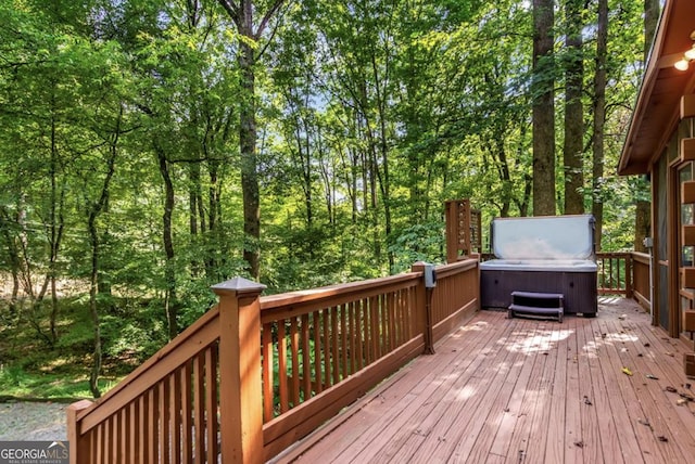 deck with a hot tub