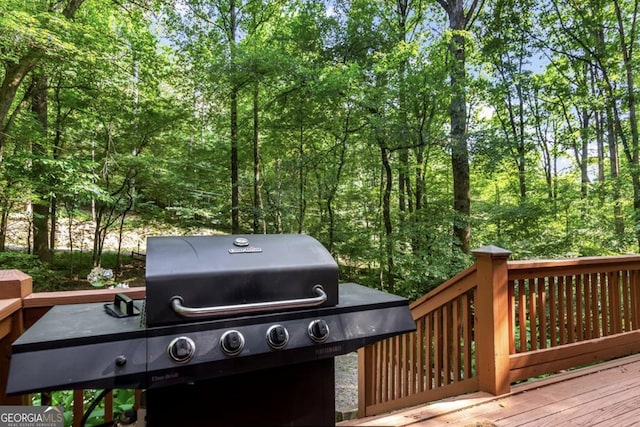 wooden deck with grilling area