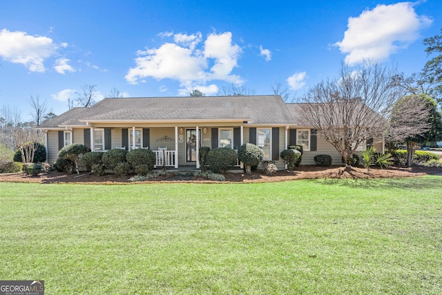 single story home with covered porch and a front lawn