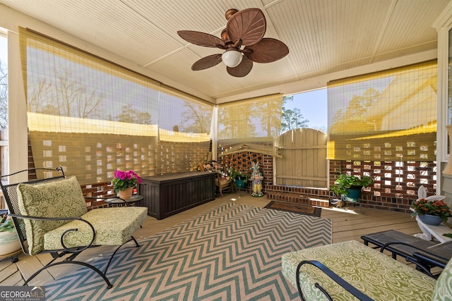 view of patio / terrace featuring a gate and ceiling fan