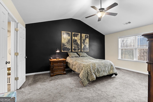 carpeted bedroom featuring a ceiling fan, lofted ceiling, baseboards, and visible vents