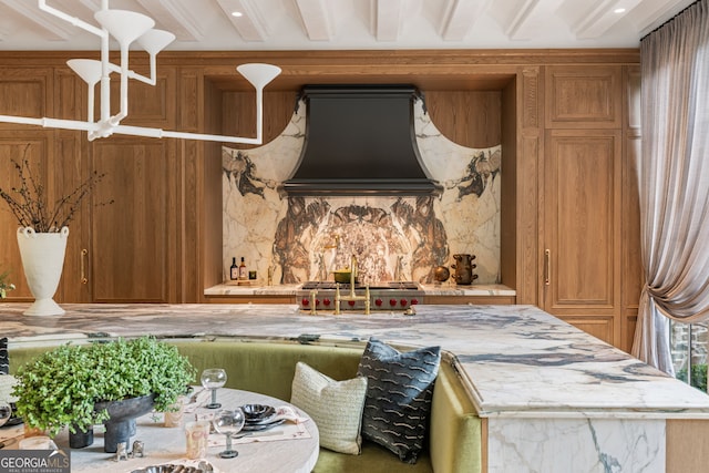 41 Blackland Rd NW, Atlanta, GA 30342 - details featuring stainless steel gas stovetop, custom range hood, and tasteful backsplash