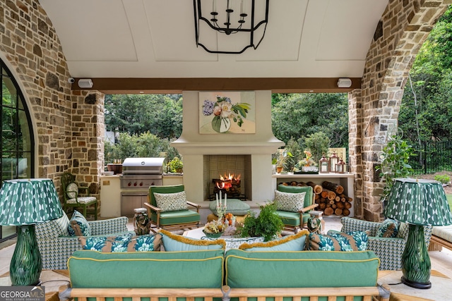 41 Blackland Rd NW, Atlanta, GA 30342 - view of patio / terrace featuring a grill and an outdoor living space with a fireplace