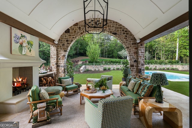 41 Blackland Rd NW, Atlanta, GA 30342 - view of patio / terrace featuring an outdoor living space with a fireplace and a fenced in pool