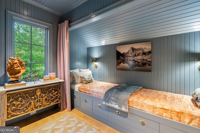 41 Blackland Rd NW, Atlanta, GA 30342 - bedroom with wooden walls, wood finished floors, and ornamental molding