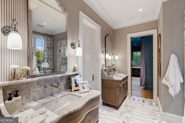 41 Blackland Rd NW, Atlanta, GA 30342 - bathroom with visible vents, vanity, backsplash, and ornamental molding