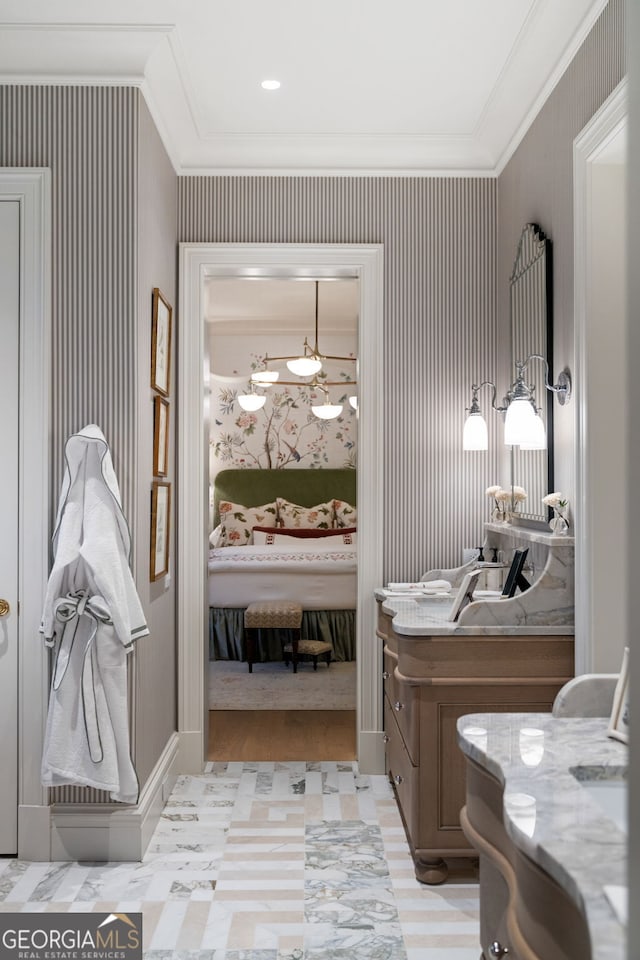 41 Blackland Rd NW, Atlanta, GA 30342 - ensuite bathroom with ornamental molding, vanity, ensuite bathroom, and wallpapered walls