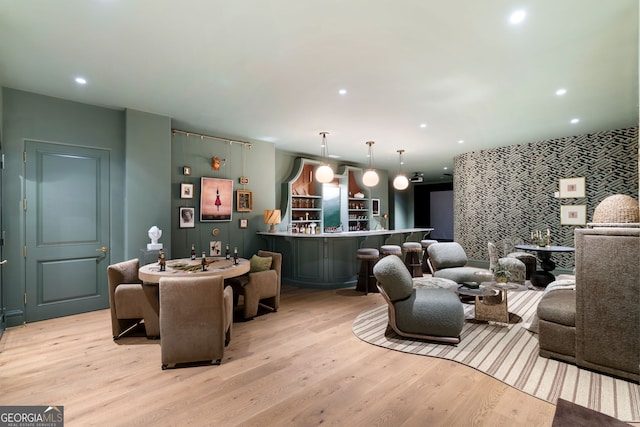 41 Blackland Rd NW, Atlanta, GA 30342 - living room featuring an accent wall, light wood-style floors, and recessed lighting