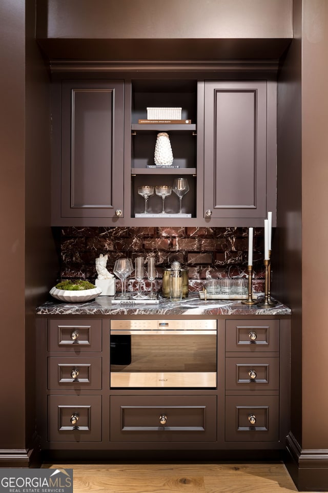 41 Blackland Rd NW, Atlanta, GA 30342 - bar with a dry bar, oven, and backsplash