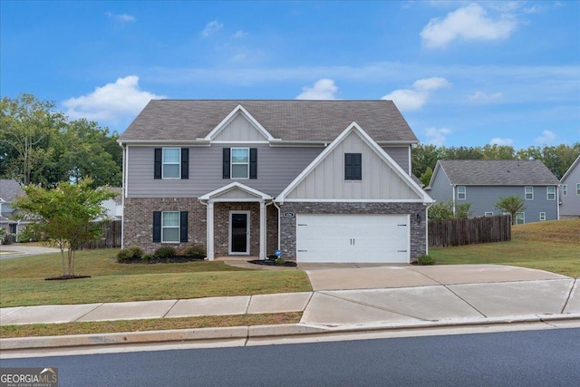 view of front of home with a garage, concrete driveway, a front yard, and fence