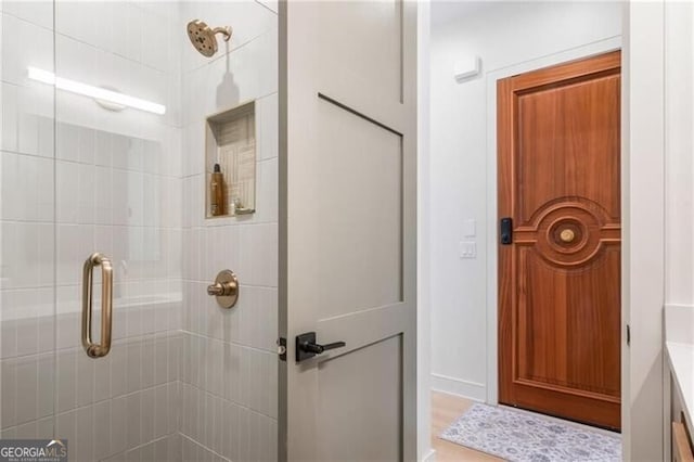 bathroom featuring a stall shower