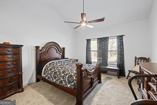 bedroom with vaulted ceiling, light colored carpet, baseboards, and ceiling fan