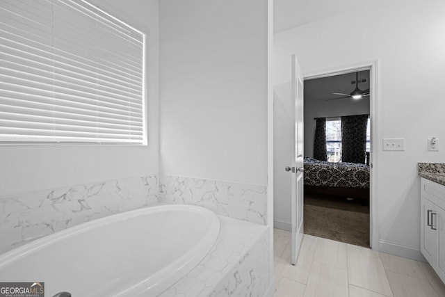 full bath featuring a bath, vanity, and ensuite bathroom