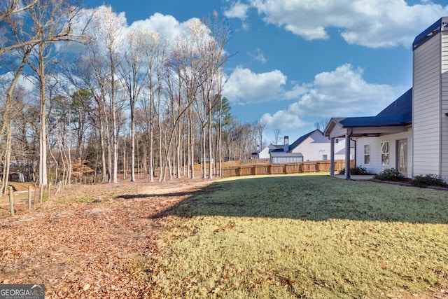 view of yard featuring fence