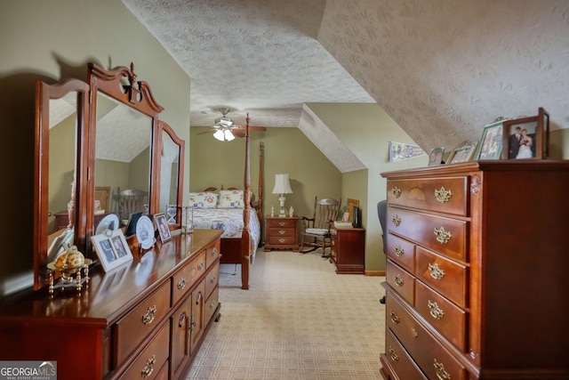 bedroom with lofted ceiling, light carpet, and a textured ceiling