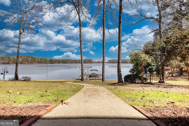 property view of water featuring a boat dock