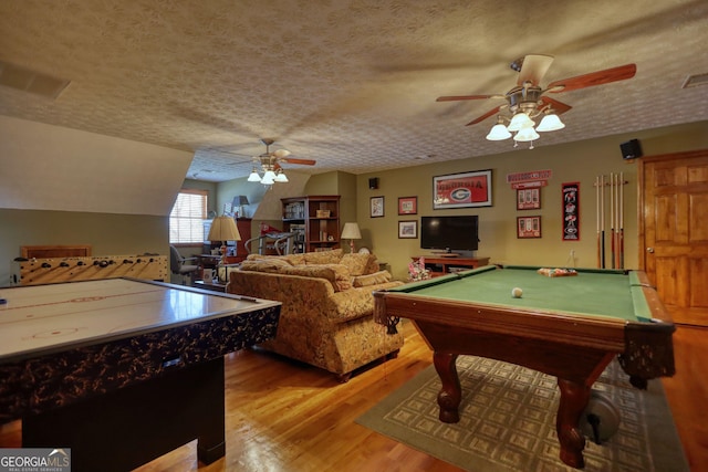 rec room featuring billiards, a ceiling fan, wood finished floors, visible vents, and a textured ceiling