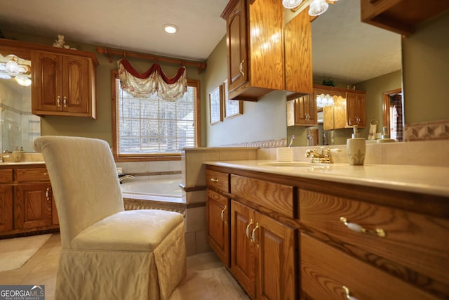 bathroom featuring tile patterned flooring, two vanities, a bath, a shower, and a sink