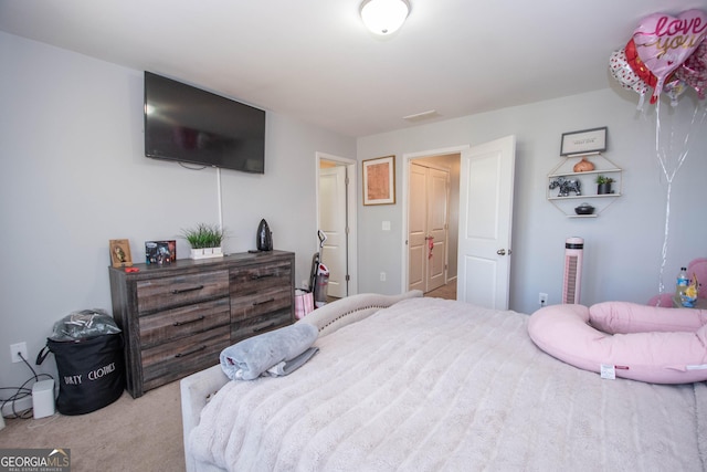 bedroom featuring carpet floors