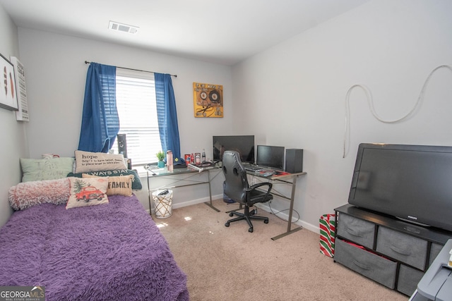 bedroom with visible vents, carpet floors, and baseboards