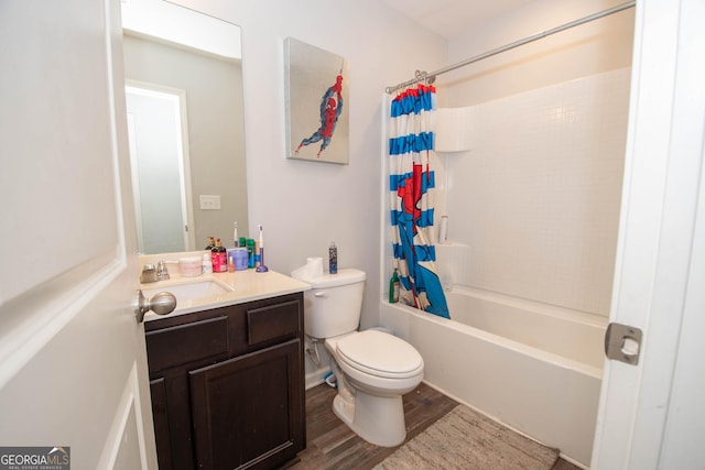 bathroom with shower / bathtub combination with curtain, toilet, vanity, and wood finished floors