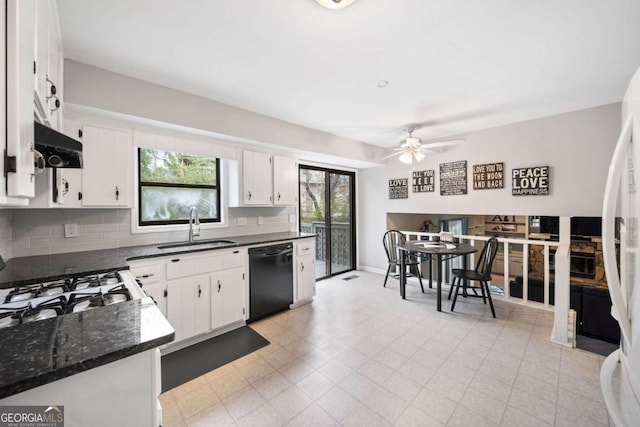 kitchen with range hood, a sink, white cabinets, dishwasher, and tasteful backsplash