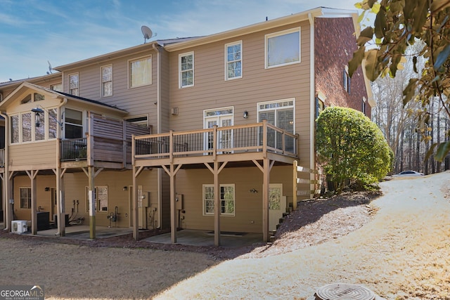 back of house featuring a patio area