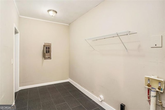 laundry area featuring laundry area, baseboards, and washer hookup