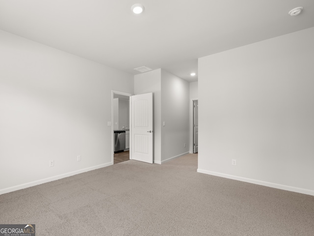 unfurnished room featuring recessed lighting, baseboards, and carpet floors