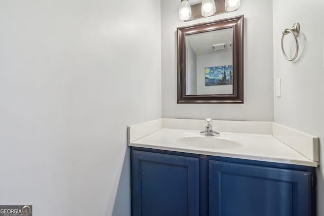 bathroom featuring visible vents and vanity