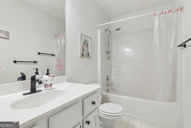 bathroom featuring vanity, toilet, and shower / bath combo