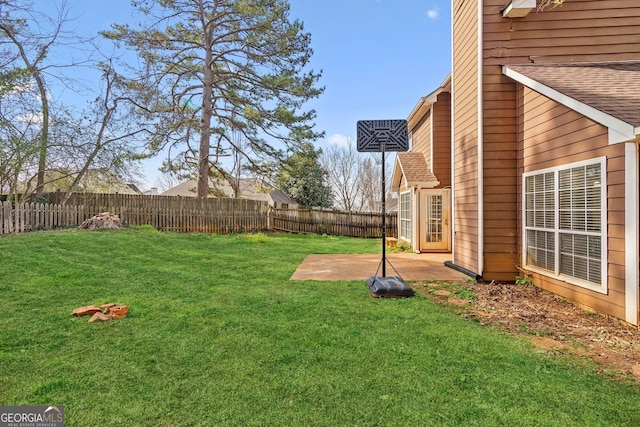 view of yard with a fenced backyard and a patio