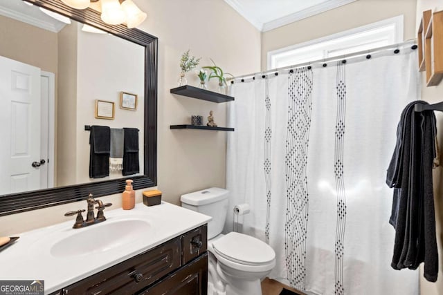 bathroom featuring shower / tub combo, vanity, toilet, and crown molding