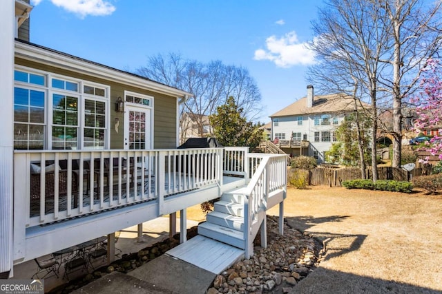 wooden deck featuring fence