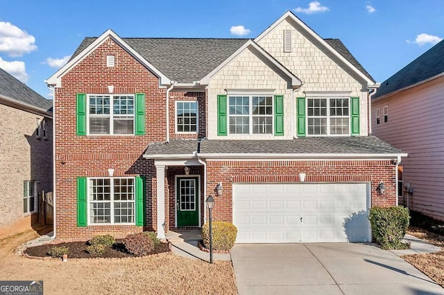 view of front of house featuring a garage, brick siding, and driveway