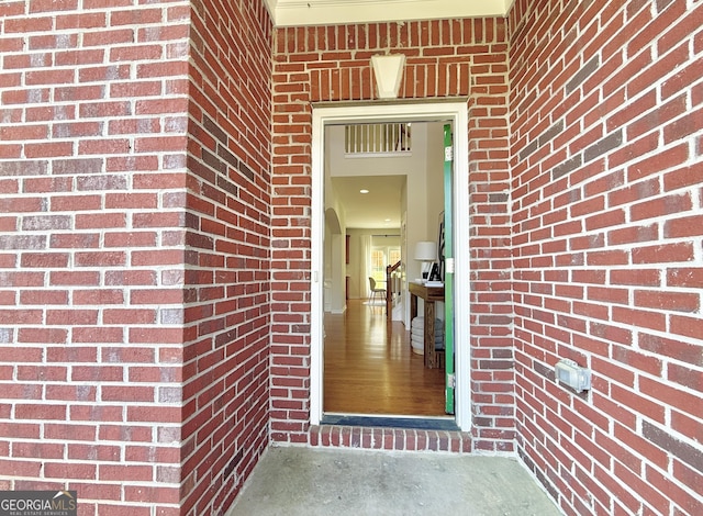 back of property featuring central AC unit, fence, roof with shingles, a patio area, and brick siding