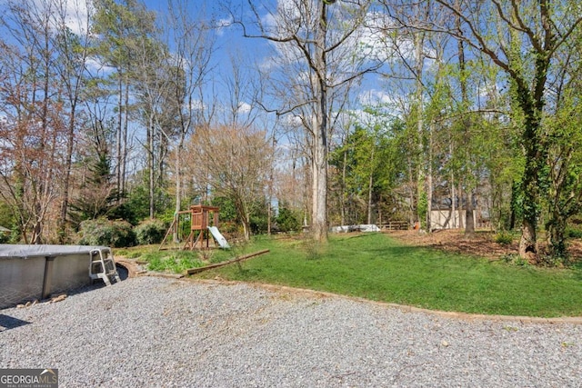 view of yard featuring a playground