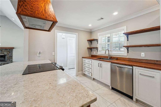 kitchen featuring visible vents, ornamental molding, a sink, open shelves, and stainless steel dishwasher