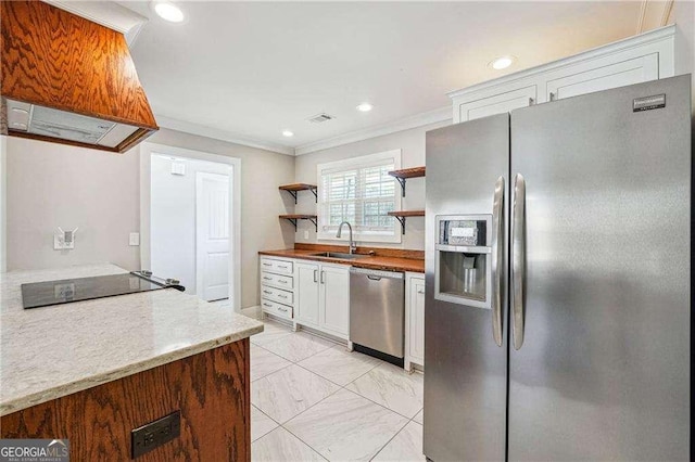 kitchen featuring open shelves, a sink, stainless steel appliances, custom range hood, and white cabinets