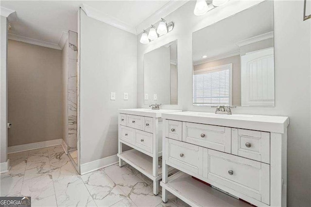 full bathroom with two vanities, marble finish floor, ornamental molding, a sink, and baseboards