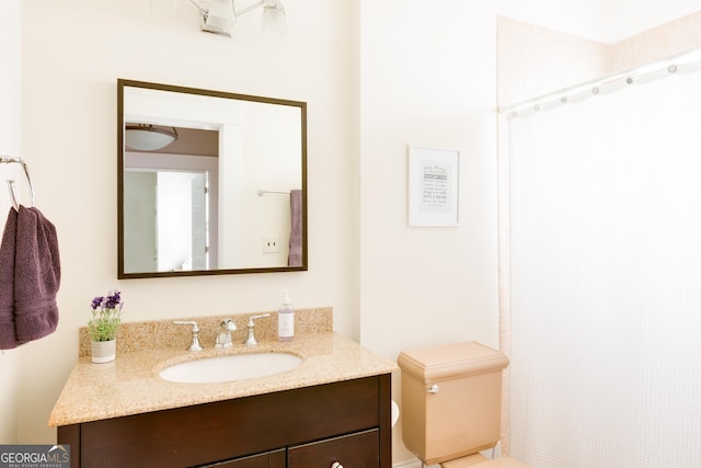 full bath with a shower with shower curtain, toilet, and vanity